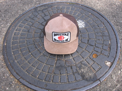 Manhole Hat on manhole cover